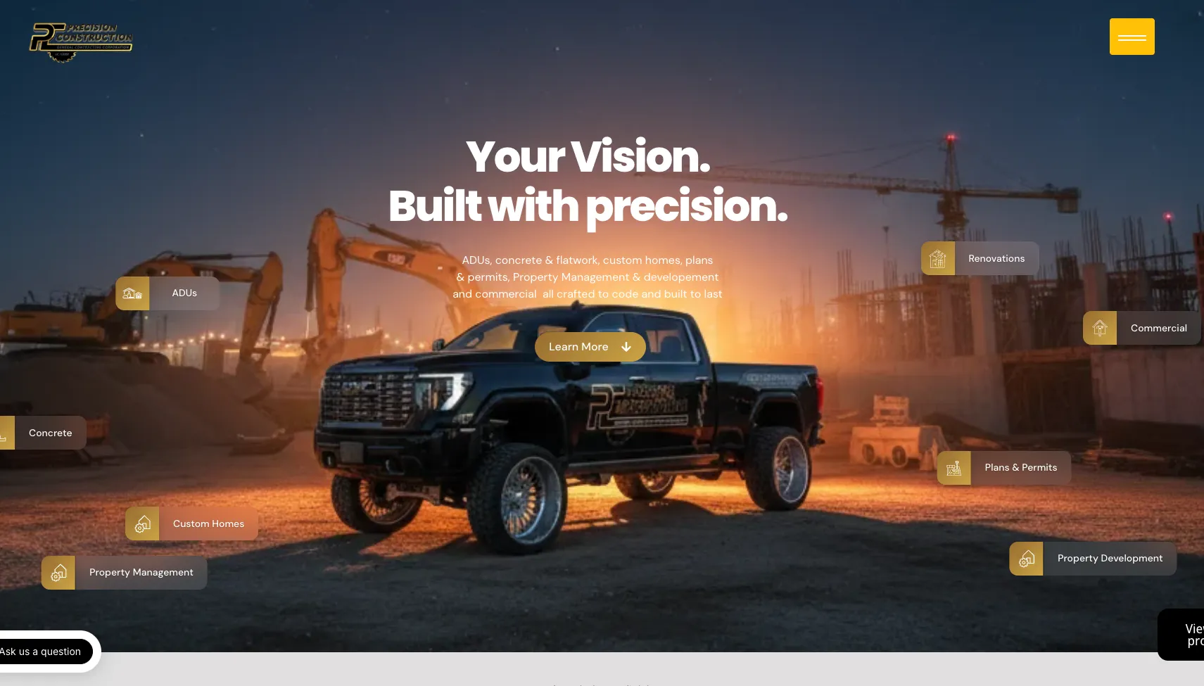 Precision Construction home page with the Your Vision. Built with precision. headline and floating service labels