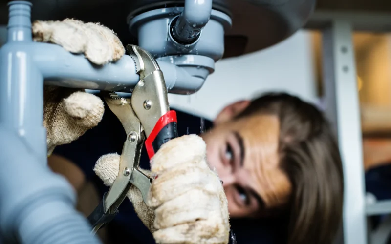 man-fixing-kitchen-sink-2025-02-10-12-57-28-utc