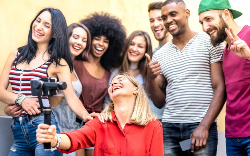 multiracial-young-friends-taking-selfie-with-mobil-2024-07-03-02-44-11-utc